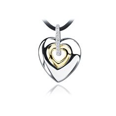 This sterling silver and 14k yellow gold heart pendant is pave-set with 13 G-H color, I1 clarity round diamonds totaling 0.07ct. Includes 18 brown leather chain. Gold Diamond Heart Necklace, Diamond Heart Necklace, Gold Heart Pendant, Heart Necklace Diamond, Heart Pendant Gold, Accessories Jewelry Necklace, Gold Heart, Leather Chain, Diamond Heart