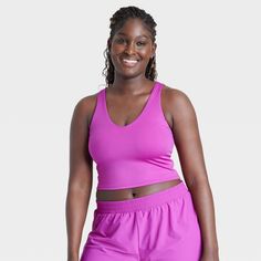 Why we're ALL IN: V-neck light-support sports bra in a solid hue is crafted from a moisture-wicking, quick-dry fabric with UPF 50+ sun protection for comfortable wear. It's designed with an opaque sheerness with a built-in shelf bra with removable cups for a customizable fit and wear. Features a V-neck and back for a sporty feel. All in Motion™: Made for every move, priced for every day. Dark Violet, Woman Weaving, All In Motion, Half Zip Pullover, Womens Fleece, Shelf Bra, Sports Bra Sizing, Pair Of Pants, Bra Cups