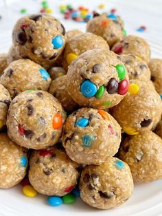 a white plate topped with cookies and candy balls