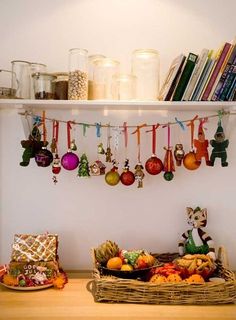 a shelf filled with christmas ornaments and other decorations