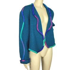 Vintage Candiss Cole Teal 100% Silk Boucle Open Front Cardigan Sweater, Women's Size Medium, Approximate Measurements Armpit To Armpit:22" Shoulder To Hem:23" Sleeve:25" Uncuffed (H) *Great Gently Used Item, This Item Is Used Vintage And May Have Barely Visible Imperfections Due To Normal Wear, Please Look Closely At All Photos As This Will Be The Best Description Of The Item *Please Note Colors May Vary On Different Devices. *All Items Are Videotaped Prior To Being Shipped For Quality Assurance. Keywords: Vintage, Designer, Wearable Art, Colorful, Silk, Teal, Knit, Boucle, Sweater, Open Front, Bold, Winter, Fall, Ladies, Women's, Spring, Usa Made, 80s, 90s, Rare, Unique, Hard To Find Blue Wool V-neck Outerwear, Blue Wool Cardigan For Fall, Blue Fitted Wool Sweater, Blue Wool Cardigan For Layering, Fitted Blue Wool Sweater, Blue Wool Long Sleeve Cardigan, Green Fitted Wool Cardigan, Fitted Blue Cardigan For Fall, Spring Blue Wool Blazer