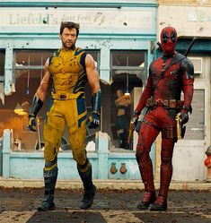 two deadpool characters standing in front of a store