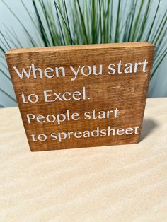 a wooden sign that says when you start to excel people start to spreadsheet