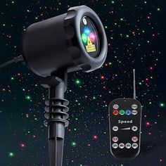 an image of a remote control on a tripod with stars in the sky behind it