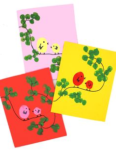 three cards with birds and leaves on them, one is pink, the other is yellow