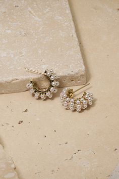 A chic blend of gold and pearls, perfect for the wedding day or everyday. Elevate your style with these lightweight, versatile earrings that add a touch of sophistication to any look! Dainty Gold Bridal Earrings With Pearl Charm, Gold Plated Tarnish-resistant Pearl Earrings For Wedding, Wedding Yellow Gold Pearl Charm Bridal Earrings, Small Hoop 14k Gold-filled Pearl Earrings For Wedding, 14k Gold-filled Pearl Earrings For Wedding, Untamed Petals, Gold And Pearls, Pearl Veil, Veil Headpiece