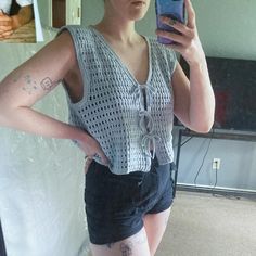 Width: 22"  Length: 17"  Acacia vest pattern by Sam Terwel. Flowy with an oversized fit. 100% cotton.  Link to pattern:  https://www.etsy.com/ca/listing/1725353904/acacia-vest-crochet-pattern-pdf-pattern?click_key=ef96b06c2460f63c9b61302606bad4204572e65c%3A1725353904&click_sum=8026be8b&ref=shop_home_recs_1&crt=1&sts=1 Tie Vest, Vest Crochet, Crochet Vest Pattern, Vest Pattern, Crochet Vest, Vest Outfits, Crochet Art, Shop Home, Womens Vest