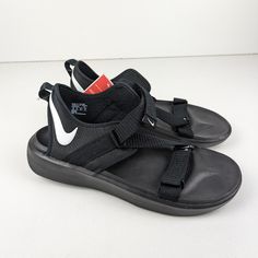 Nike Vista Mens Sandals Black White Hook And Loop Dj6606-001. New With Tags. Summer Slip-on Sport Sandals For Streetwear, Black Leather Sport Sandals For Summer, Nike Sport Sandals With Cushioned Footbed For Outdoor, Nike Outdoor Sandals With Cushioned Footbed, Black Flat Sandals For Outdoor, Sporty Sandals With Rubber Sole For Streetwear, Summer Outdoor Sneakers With Ortholite Insole, Outdoor Low-top Summer Slides, Summer Outdoor Low-top Slides