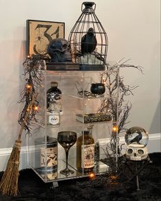 a halloween display with liquor bottles and decorations