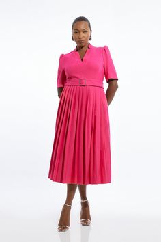 Meet The Everlasting Style Icon - The Forever Dress. A Timeless Addition To Any Well-Considered Wardrobe, This Petite Piece Features A High Notched Collar, V-Neck Front, A Fit And Flare Silhouette, And A Belted Waist. Feel Elevated In Our Plus Size Midi Dress, As The Pleated Skirt Moves With You, And The Structured Shoulders Bring The Drama. Style It With Heels Or Loafers For An Elevated Daytime Look, Perfect For Year-Round Wear. Plus Size Tailored Structured Crepe Forever Pleat Midi Dress High Petite Wedding Guest Dresses, Plus Size Midi Dress, Plus Size Workwear, Pleat Dress, Tall Dresses, Pleated Midi Dress, The Drama, Plus Dresses, Notched Collar