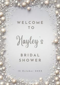 the welcome sign for nayley's bridal shower is surrounded by white pearls