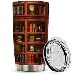 a glass tumbler with bookshelves on it and a clock in the middle