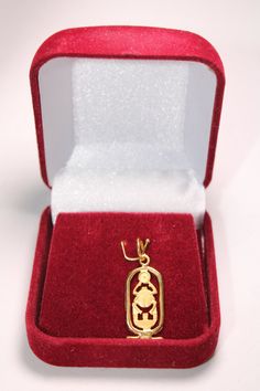 "Egyptian Hand Crafted 18K Yellow Gold Charming Cartouche Scarab Pendant 1.7 Gr Weight Approximate : 1.7 Gr Height : 1.4\"= 36 mm Width : 0.43\" = 11 mm ✔ IT IS Tested & SIGNED WITH THE EGYPTIAN Gold Government HALLMARK FOR 18K GOLD to Ensure Authenticity. ✔ Lovely gift idea ABSOLUTELY GORGEOUS, LOOKS FABULOUS ON. ✔ 100% Egyptian handmade. ✔ Condition: A brand-new, exactly as on the photos. ★ GIFTS ✔ All items are packaged in a paper jewelry gift box, ready for gifting. ✔ If you are sending Antique 22k Gold Pendant Jewelry, Temple Jewelry Oval Jewelry Gift, Gold Oval Temple Jewelry, Temple Jewelry Gift With Oval Shape, Oval Temple Jewelry As A Gift, Oval Temple Jewelry For Gifts, Antique Gold Ankh Jewelry, Traditional Yellow Gold Oval Pendant Jewelry, Handmade Yellow Gold Rectangular Pendant