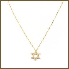 This sparkling necklace is a newer version of the classic Star of David. The perfect size to wear all the time with sparkling CZ pavé to catch the eye. The star moves freely on a delicate chain. Available in sterling silver or gold vermeil. Pendant is 1/2" in diameter, hung on a 16" sterling silver chain with 2" extender. Made by Felix Z Designs Dazzling Star-shaped White Gold Necklace, Dazzling Star Shaped White Gold Necklace, Dazzling White Gold Star Necklace, Gift Delicate Chain Necklace With Star Of David Pendant, Star-shaped Cubic Zirconia Diamond Necklace Gift, Dainty Star-shaped Diamond Necklace For Gift, Fine Jewelry Star Of David Necklace With Star Charm, Sterling Silver Star Of David Fine Jewelry Necklace, Yellow Gold Star Of David Necklace With Delicate Chain