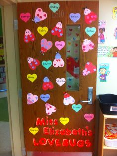 a door decorated with hearts and the words miss elizabeth's love bug