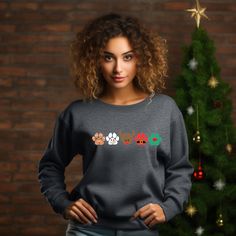 Get ready to sleigh the holiday fashion game with our Christmas Dog Paw Sweatshirt! 🐾🎅 Unleash your inner paw-ty animal with gingerbread, snowman, reindeer, Santa, and elf dog paws. 🐶❄️🦌 🌈 Available in a rainbow of colors and sizes from infant to adult 5X, this cozy sweatshirt is perfect for all dog lovers. 🐕💖 It's not just a sweatshirt; it's a dog lover's dream come true! 🐾🐶 Whether you're a dog mom or a dog enthusiast, this is the ultimate Christmas dog sweatshirt to make tails wag an Winter Dog Print Crew Neck Top, Winter Crew Neck Top With Dog Print, Casual Dog Print Sweatshirt For Winter, Casual Winter Sweatshirt With Dog Print, Ty Animals, Gingerbread Snowman, Elf Reindeer, Reindeer Dog, Santa Elf