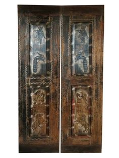 two wooden doors with paintings on them