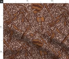 a brown and white fabric with birds on it