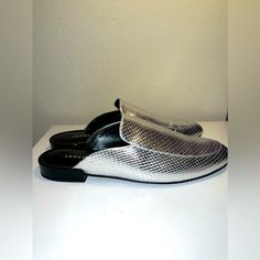 New Without Box. Runs Small Silver Leather Mules In Luxury Style, Luxury Silver Leather Mules, Flat Silver Leather Mules, Silver Leather Round Toe Mules, Elegant Silver Slip-on Mules, Silver Pointed Toe Mules For Formal Occasions, Silver Slip-on Mules For Formal Occasions, Silver Round Toe Mules For Evening, Silver Leather Mules For Party