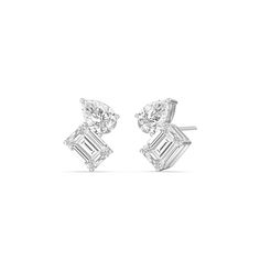 An excellent pair for everyday or special occasion wear, these earrings provide the perfect amount of sparkle to match your modern style. The stud earrings feature a pear-cut and an emerald-cut diamond sitting side by side on pronged baskets. Expect these studs with screw-back closure to infuse a hint of geometric glamour into any ensemble. Luxury Diamond White Pear-shaped Diamond Earrings, Luxury Emerald Cut Earrings, Luxury White Multi-stone Earrings, Luxury White Gold Pear-shaped Earrings, Trending Diamond Jewelry, Modern Pear-shaped Earrings For Anniversary, Modern Emerald Cut Diamond Earrings, Modern Diamond Pear-shaped Earrings, Modern Pear-shaped Diamond Earrings