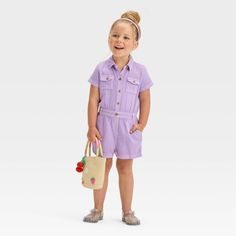 This Solid Romper from Cat & Jack™ in lavender adds a soft pop of color to your toddler's closet. Designed with short sleeves, it sports a classic collared neckline with front buttons, plus side and chest patch pockets for functional style. The breathable cotton-blend material ensures comfy all-day wear and the full elastic waistband offers a good fit. Cat & Jack™: Designed for all children so you can trust it's made for yours. Long Sleeve Tulle Dress, Toddler Closet, Solid Jumpsuit, Girls Floral Dress, Functional Style, Denim Romper, Sleeveless Floral Dress, Light Blue Denim, Floral Romper