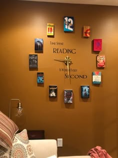 a living room with a clock on the wall that reads reading is a world every second