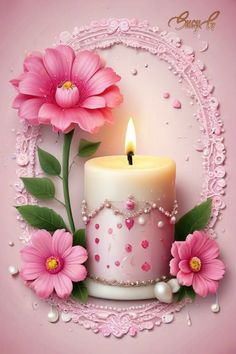 a pink candle with flowers and pearls around it