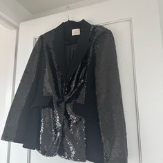 Cinq Sept Sequins Blazer Jacket Complementary Satin Lapel Collar Black Pre-Owned, Excellent Condition Size: 4 / Small Color: Black Material(S): Polyester -One Button Closure -Black Sequins -Flap Pockets At Waist Black Sequined Long Sleeve Blazer, Black Sequin Long Sleeve Blazer, Glamorous Long Sleeve Blazer For Work, Tailored Long Sleeve Glamorous Outerwear, Glamorous Tailored Long Sleeve Outerwear, Formal Black Outerwear With Sequins, Formal Black Sequined Outerwear, Tailored Glamorous Fall Outerwear, Glamorous Tailored Fall Outerwear