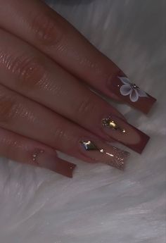 Nail Inspiration Graduation, White Nails Pink Gems, Medium Size Nails Acrylic Pink, Medium Nails With Gems, Brown Acrylic Nails With 3d Flowers, Latina Nail Designs Medium, Short Acrylic Nails Rhinestones, Simple Acrylic Nails With Rhinestones, Latina Nail Designs White