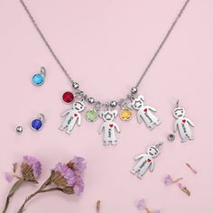 Keep your children close all the time with our My Children Engraved Stainless Steel Necklace. This custom necklace features two figures of a young boy and a young girl. You can engrave each figure with a special name and add a corresponding birthstone! This engravable necklace can be the perfect gift to give at a birthday, wedding, or any special occasion. A customizable gifts will always be such a touching gift. To customize your own necklace, enter the names into the text box and select the bi Grandmother Christmas Gift, Engravable Necklace, Family Pendant Necklace, Family Pendant, Necklace Family, Necklace With Kids Names, Names Necklace, Mother Necklace Personalized, Tree Gifts