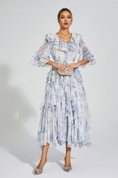 Flowy Floral Print V-neck Dress, Elegant Chiffon Dress With Ruffle Hem For Garden Party, Elegant Flowy V-neck Dress With Floral Print, Floral V-neck Chiffon Dress With Ruffles, Feminine Ruched Chiffon Midi Dress, Ruched Chiffon V-neck Dress, Ruched Tiered Chiffon Dresses, Elegant Floral Ruffle Dress For Evening, Elegant Floral Dress With Ruffles For Evening