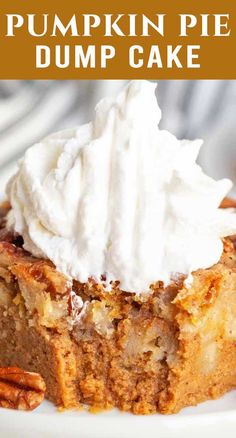 pumpkin pie dump cake on a white plate with whipped cream and pecans in the background