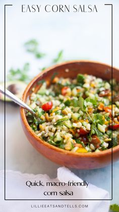 a person holding a spoon in a bowl filled with rice and vegetables