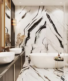 a marble bathroom with two sinks and a bathtub