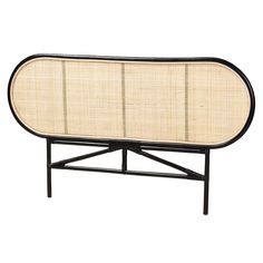 the back end of a black and white table with a large bamboo panel on it