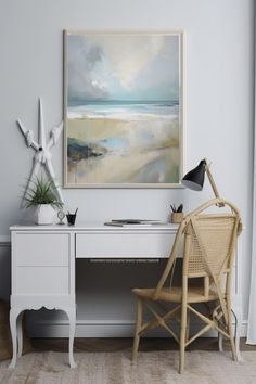 a painting hanging on the wall above a desk