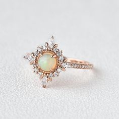 Felicegals Natural Opal Engagement Ring Cluster Halo Antique Milgrain Ring Marquise Moissanite Peekaboo Cathedral Ring14k solid rose gold band5mm Natural Cabochon OpalColourless Moissanite AccentsThe moissanite accents version features VS t... Antique Opal Ring, Engagement Ring Cluster, Engagement Rings Wedding Bands Set, Cathedral Ring, Opal Ring Vintage, Photoshop Ideas, Milgrain Ring, Vintage Inspired Rings, Unhealthy Obsession