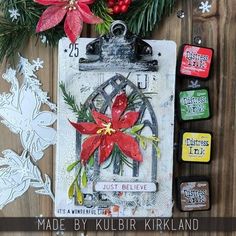 some christmas decorations are laying on a wooden surface with the words made by kulbir kirkland