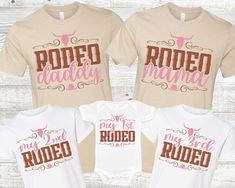 three baby onesuits with rodeo shirts on them