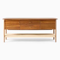 the sideboard is made from solid wood and has three drawers, one with an open drawer