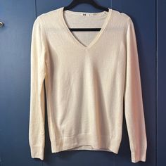 Women's Uniqlo V-Neck Cashmere Ivory Sweater Size M, Please See Photos. Excellent, Like New Condition, Never Worn (No Tags, Unfortunately!). Comes From A Non-Smoking Home. Measures 25" From Shoulder Seam To Bottom Hem And Is 19" From Armpit To Armpit. I Have A Couple Other Uniqlo V-Neck Sweaters Available That Are Cotton/Cashmere Blend Of The Same Size--Have A Look! Thank You So Much! Off White V-neck Top For Fall, Classic Cream V-neck Sweater For Spring, Casual Off-white V-neck Sweater, Uniqlo Sweater, Ivory Sweater, Uniqlo Women, Thank You So Much, Uniqlo, Vneck Sweater