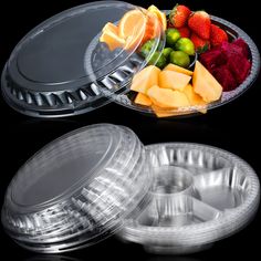 two clear plastic plates with different types of fruit in each plate and one is empty