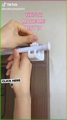 two hands are holding an object in front of a wall with the words tiktok made me buy it