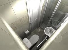 an aerial view of a bathroom with toilet and shower