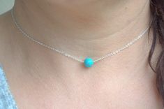 single turquoise bead necklace, sterling silver dainty necklace, tiny gemstone necklace Tiny turquoise bead necklace. Materials: - natural blue turquoise bead - 8 mm . - sterling silver delicate chain - silver components - because I use natural materials, they bead may vary in shape, size and color. Gift boxed. Link to my shop https://www.etsy.com/shop/SilverIrisJewelry?ref=hdr *INTERNATIONAL VAT TAXES & CUSTOMS FEE'S may be charged by your country's customs and/or postal system in order for Turquoise Sterling Silver Jewelry With Tiny Beads, Sterling Silver Blue Jewelry With Tiny Beads, Blue Sterling Silver Jewelry With Tiny Beads, Blue Sterling Silver Necklaces With Tiny Beads, Dainty Turquoise Single Strand Jewelry, Dainty Turquoise Necklace With Tiny Beads, Minimalist Sterling Silver Necklace With Tiny Beads, Dainty Turquoise Sterling Silver Necklace, Minimalist Single Strand Blue Jewelry