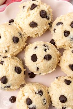 a white plate topped with cookies and chocolate chips