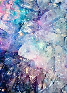 an abstract image of crystals and other things in blue, pink, purple and white