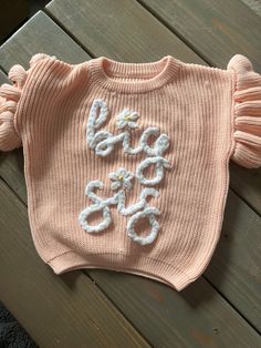 Big sis sweater for baby announcement Cute White Embroidered Sweater, Cute Embroidered Knit Tops, Cute Embroidered Spring Sweater, Cute Winter Sweater With Letter Embroidery, Cute Winter Sweater With Embroidered Text, Spring Long Sleeve Sweater With Embroidered Text, Cute White Sweater With Embroidered Text, White Cute Sweater With Embroidered Text, Cute Custom Embroidered Sweater For Winter