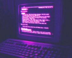 a computer screen with the words dreaming you were back home on it in purple light