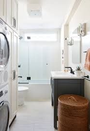 a washer and dryer in a small bathroom